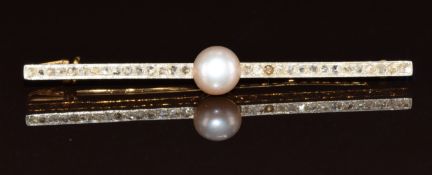 A yellow metal c1900 brooch set with a pearl and rose cut diamonds, 4.1g, 5cm