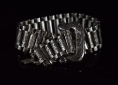 Victorian silver bracelet made up of engraved links and a buckle clasp, 42.1g, 22cm (adjustable)