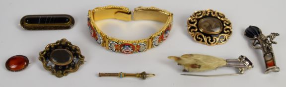 A collection of jewellery including a micro mosaic bracelet and brooches including two mourning,