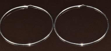 A pair of 18ct white gold hoop earrings, 7.7g, 6.6cm