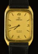 Omega De Ville gentleman's wristwatch with black hands and baton hour markers, gold Arabic