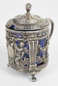 French silver cruet with embossed decoration, French late 18thC silver marks and blue glass liner,
