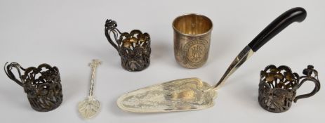 Three Japanese silver drink vessel holders with floral decoration, marked to undersides Samurai