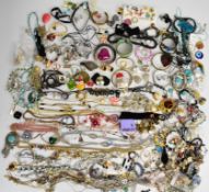 A collection of jewellery including cufflinks, glass pendants, bracelets, mother of pearl bangle,