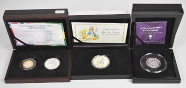 Four cased proof silver coins and medals comprising 2019 Easter Peter Rabbit, 2017 Piedfort Queen'