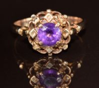 A 9ct gold ring set with a round cut amethyst, 3g, size P