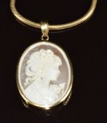 An 18k gold pendant set with a cameo (2.8g, 2.8 x 2cm) on 9ct gold chain, 9.4g, 39cm