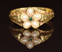 Victorian mourning ring with engraved shoulders, set with an emerald and split pearls and with