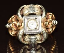 A bi-coloured 18ct gold ring set with spinel, 8.6g, size L