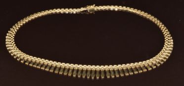 A 9ct gold Cleopatra style necklace, 18.6g, 40cm