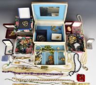 A collection of costume jewellery including Art Deco, silver and Monet necklaces, 9ct gold brooch