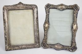 Two Edward VII hallmarked silver photograph frames, both to suit 6 x 4 inch photo, one Birmingham