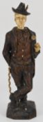 Late 19th / 20thC German / Black Forest carved wood and ivory automaton of a whistling tramp leaning