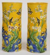 Pair of Chinese Sancai glazed faux bamboo vases with relief moulded decoration of birds amongst