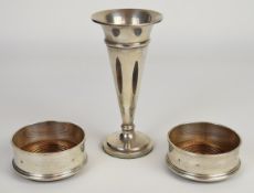 Pair of Elizabeth II feature hallmarked wine bottle coasters, London 1990, maker M C Hersey & Son