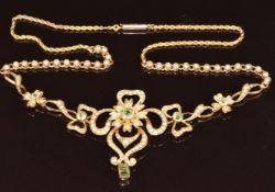 Edwardian 9ct gold necklace set with split pearls and peridot, 12.2g, 43cm