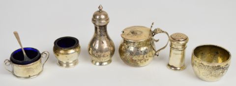 Victorian and later hallmarked silver condiments comprising two peppers, two salts and a mustard