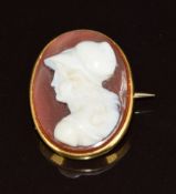Victorian yellow metal brooch set with an agate cameo depicting a young woman, 4.7g, 1.8 x 2.2cm