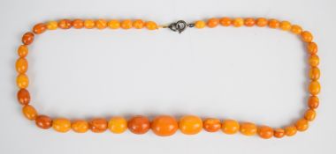 Baltic amber necklace of graduated beads, the, largest 15.5 x 19.4mm, smallest 6.7 x 8.5mm, 27.8g