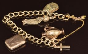 A 9ct gold charm bracelet with two 9ct gold charms, yellow metal tassel charm (19g), silver gilt
