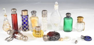 Collection of 19th / 20thC glass scent / perfume bottles, some hallmarked silver mounted, tallest