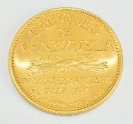 1957 Venezuelan .900 Mara gold coin, 6g