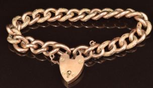A 9ct gold curb link bracelet with alternating engraved links and heart padlock clasp, 19.4g, 18cm