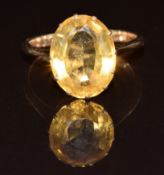 A 9ct gold ring set with an oval cut citrine, 3.4g, size Q