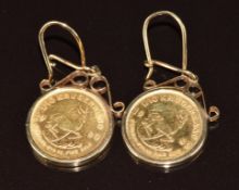 A pair of 9ct gold earrings each set with a 1980 one tenth krugerrand coin, 8.5g