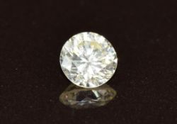A loose 0.52ct round brilliant cut diamond, with certificate