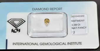 A loose 0.39ct pear brilliant cut natural fancy intense brownish yellow diamond, with certificate