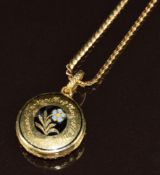 Georgian yellow metal mourning locket set with enamel depicting a wilting flower, engraved '