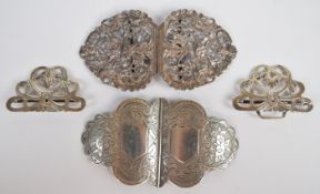 Three Victorian and later hallmarked silver nurse's belt buckles comprising a hinged example