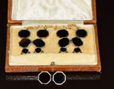 A set of 9ct and 18ct gold cufflinks, six buttons and four studs, all set with onyx, 15.7g