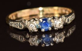 An 18ct gold ring set with a sapphire and diamonds, 2g, size K