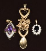 Thee 9ct gold pendants, one a Welsh love spoon, another set with amethysts and diamonds and the