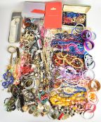 A collection of costume jewellery including beaded necklaces, Rotary watch, vintage brooches,