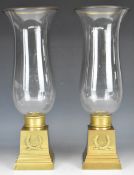Pair of French brass and glass storm lanterns, height 46cm