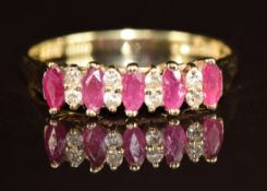 A 14k gold ring set with rubies and diamonds, 1.8g, size N