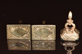 A pair of 9ct gold cufflinks (6.8g) and a 9ct gold seal/ fob set with agate (5.1g)