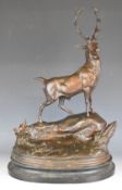 After Heizler bronzed Spelter figure of a red deer stag, on naturalistic base impressed Heizler