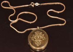A yellow metal locket with engraved floral decoration (3.5 x 2.8cm) on 9ct gold chain, 13g, 40cm