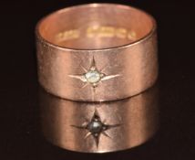 A 9ct rose gold ring set with a rose cut diamond in a star setting, Birmingham 1917, 5.1g, size S