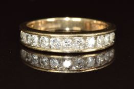 A 9k gold ring set with eleven diamonds, the total diamond weight approximately 0.5ct, 2.9g, size M