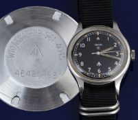 Smiths British military issue wristwatch with luminous hands and hour markers, Arabic numerals,