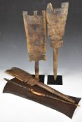 African tribal items, Turkana Kenya metal shield and three Tuareg Mauretania wooden tent pegs