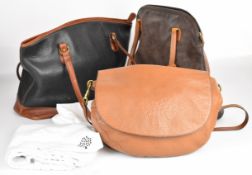 Three designer leather bags including Coach and Mulberry, largest W40cm