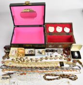 A collection of jewellery including amber necklace, six Miracle brooches, Wedgwood brooch, silver