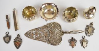 Silver items comprising a pair of salts marked sterling, hallmarked silver salt raised on three