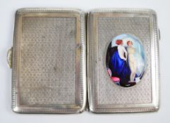 George V hallmarked silver cigarette case with enamel plaque of a nude lady to front, Chester